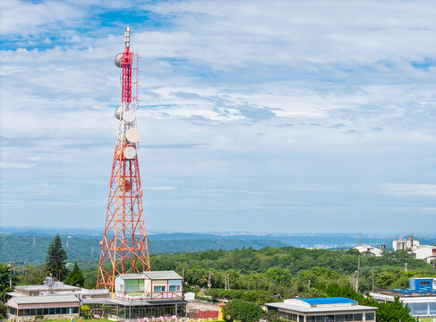 Red White Telecommunication Tower with Satellite Dishes