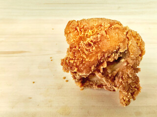 Savory Fried Chicken Breast on Wood Texture