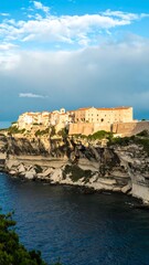 Obraz premium Historic fortress on coastal outcrop