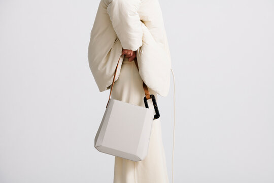 Minimalist Tote Bag Held Outdoors with Stylish Modern Fashion Ae