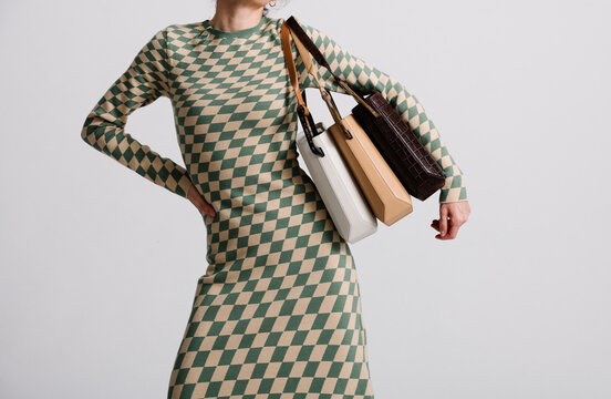 Stylish Checkered Outfit with Elegant Handbags for Modern Fashio