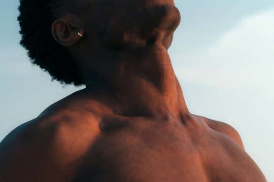 Close up of black man's muscular neck