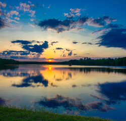 Fototapeta premium sunset over the lake