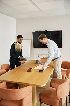Meeting in modern conference room with two people