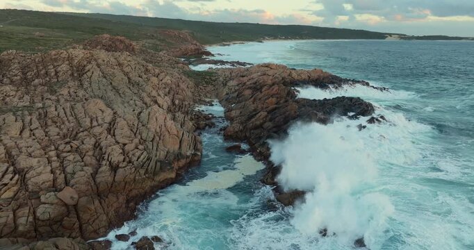 4k Aerial views of rugged rocky coastline in South West Australia at sunset