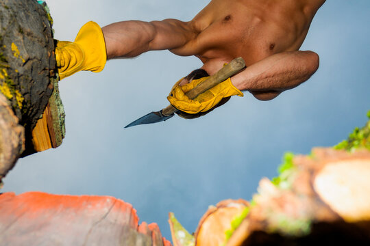 Strong Man Holds An Axe To Chop Wood