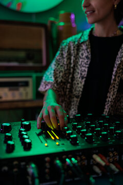 DJ mixing music at a club.