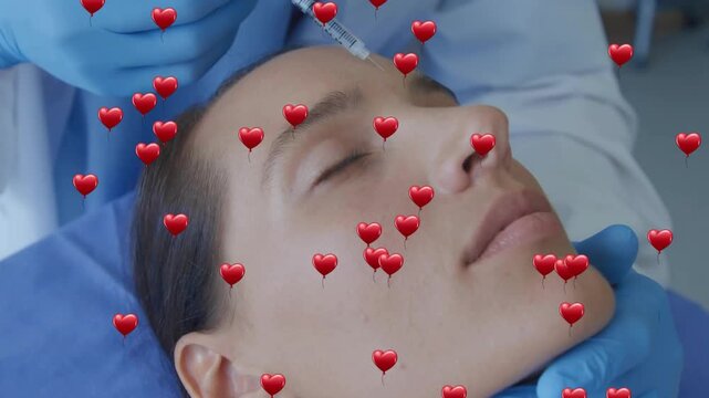 Practitioner inserting needle and administering injections creating floating hearts for treatment