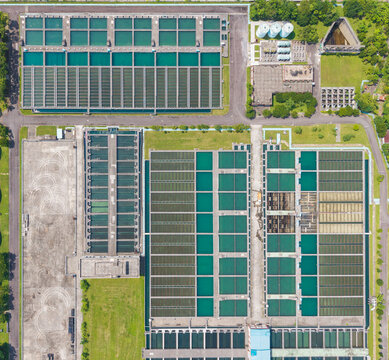 Large Water Treatment Facility Aerial View with Tanks