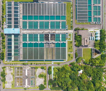 Large Water Treatment Facility Aerial View with Tanks