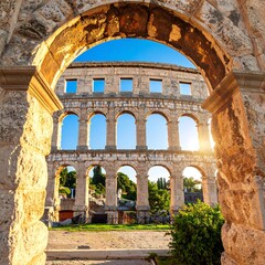 Ancient arena through an archway