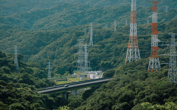 Industrial Landscape of Valley and Power Lines.