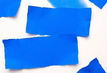 Several pieces of vibrant blue paper, ripped edges, isolated on white background,   blue,  design element