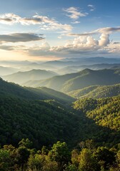 Majestic Green Mountain Range Under Cloudy Sky During Sunset