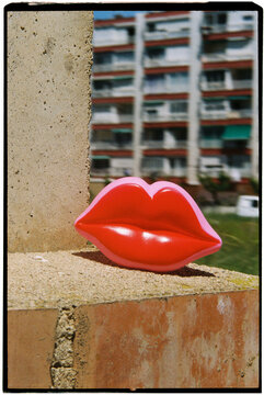red lips on a brick wall, 35mm