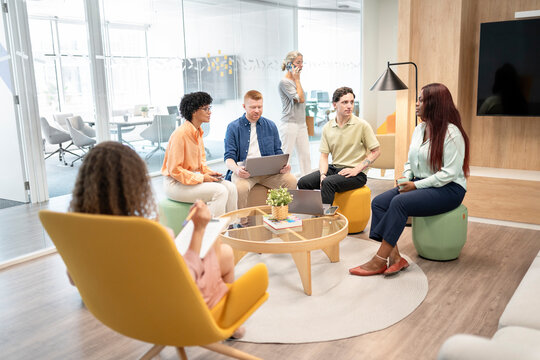 Business people working together in modern office meeting room