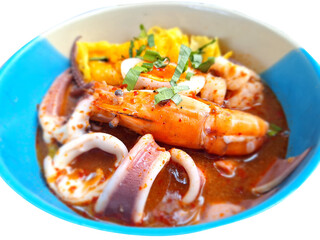 Spicy Thai seafood soup with shrimp and squid