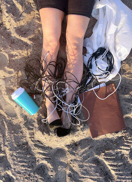 Overworked Business Woman at Beach Trying to Relax