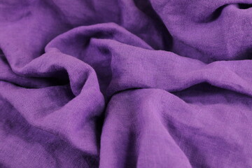 Purple fabric background. Selective focus.