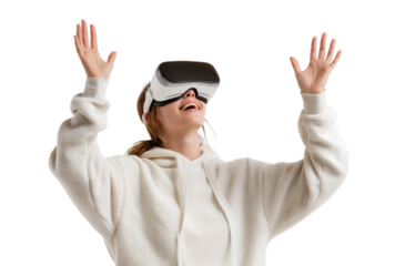 A young woman wearing a VR headset with raised hands, showing excitement from immersive digital experience.