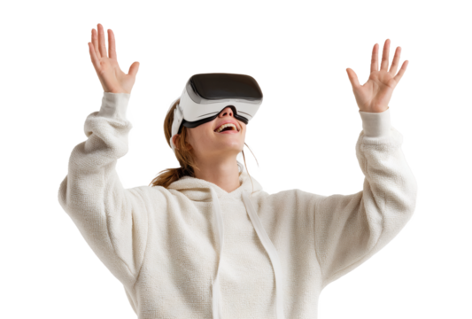 A young woman wearing a VR headset with raised hands, showing excitement from immersive digital experience.