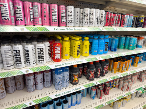 Prime Hydration and Energy Drinks on Store Shelf

