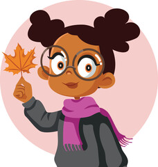 Autumn Girl of Black Ethnicity Holding Dry Leaf Vector Cartoon Hiker. Cheerful kid feeling happy about the autumnal season
