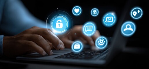 Close-up of hands typing on laptop with glowing digital security icons