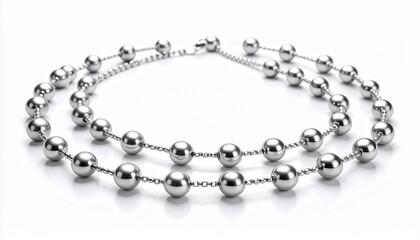 Two silver bead necklaces arranged in overlapping circles, featuring evenly spaced, polished spherical beads on fine chains, creating a sleek and uniform aesthetic.
