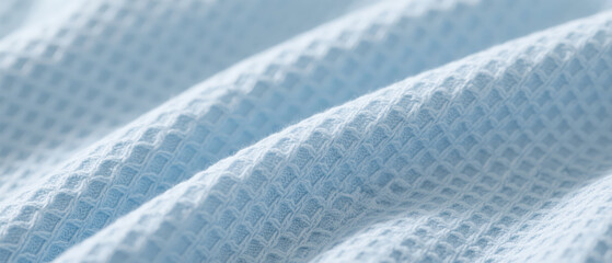 Blue waffle fabric wrinkle texture closeup