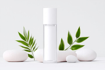 Clear cylindrical airless pump bottle mockup on white