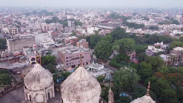 Aerial view of a mosque surrounded by mall houses in lucknow