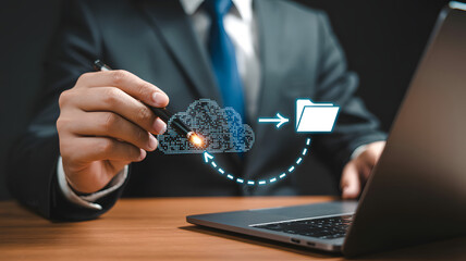 Professional businessman uses digital cloud technology to organize files on laptop