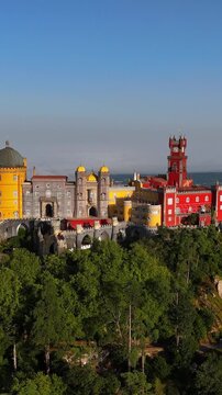 Pena Palace in Sintra, near Lisbon, Portugal, Europe.
Aerial shot of Sintra National Park and its fairytale villas.