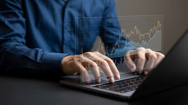 Professional analyst tracking financial growth on digital dashboard with laptop