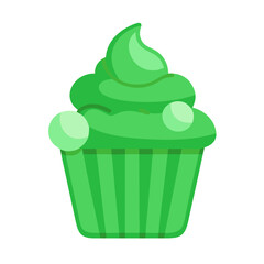 Green cupcake with frosting and candy decorations