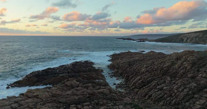 4k Aerial views of rugged rocky coastline in South West Australia at sunset