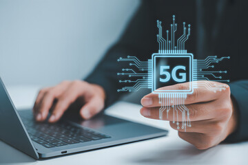 Man holding futuristic 5G chip symbol near laptop, symbolizing digital connection