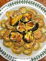 Crispy kimbap jeon made by pan-frying seaweed rice rolls in a savory egg batter. A delightful twist on classic kimbap, combining crunch and flavor in every satisfying bite.