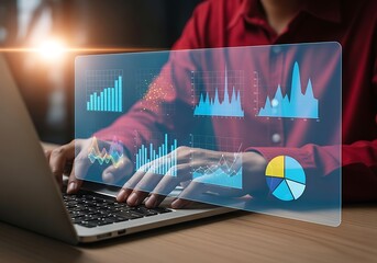 Analyzing business data trends with advanced graphical representations and digital analytics on a laptop computer