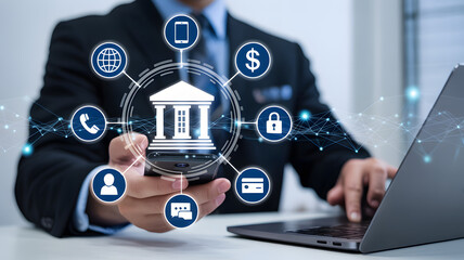 Man uses smartphone and laptop with financial network icons for digital banking