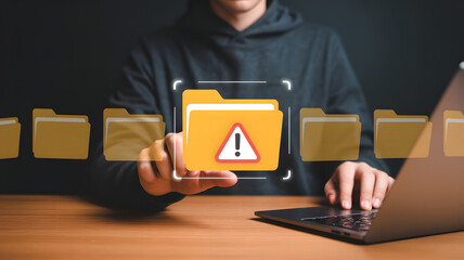 Man interacts with digital interface displaying warning on file folder data security