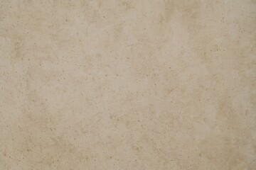 Obraz premium Beige Concrete Wall with Subtle Texture for Minimalist Backgrounds