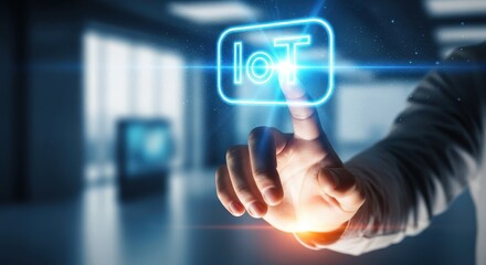 Businessman's hand touching a glowing Internet of Things icon on a virtual user interface.