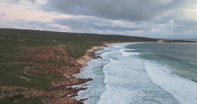 4k Aerial views of rugged rocky coastline in South West Australia at sunset