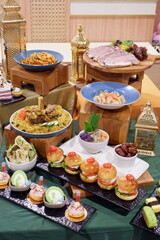 A close-up shot of a prepared table full of yummy meals for a party. buffet catering food arrangement on table