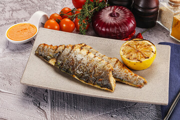 Grilled seabass fillet with lemon