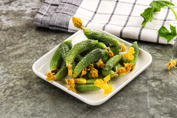 Raw gherkin cucumbers in the bowl