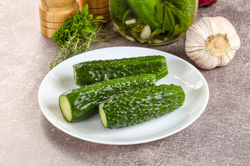 Homemade lighty salted cucumbers with herbs