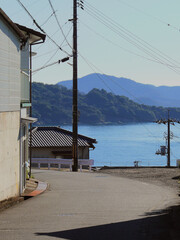 The Inland Sea of Japan can be seen from the road in the residential area.